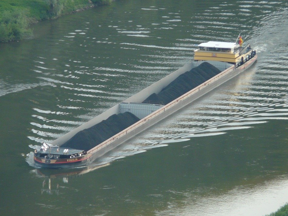 ship with coal on river