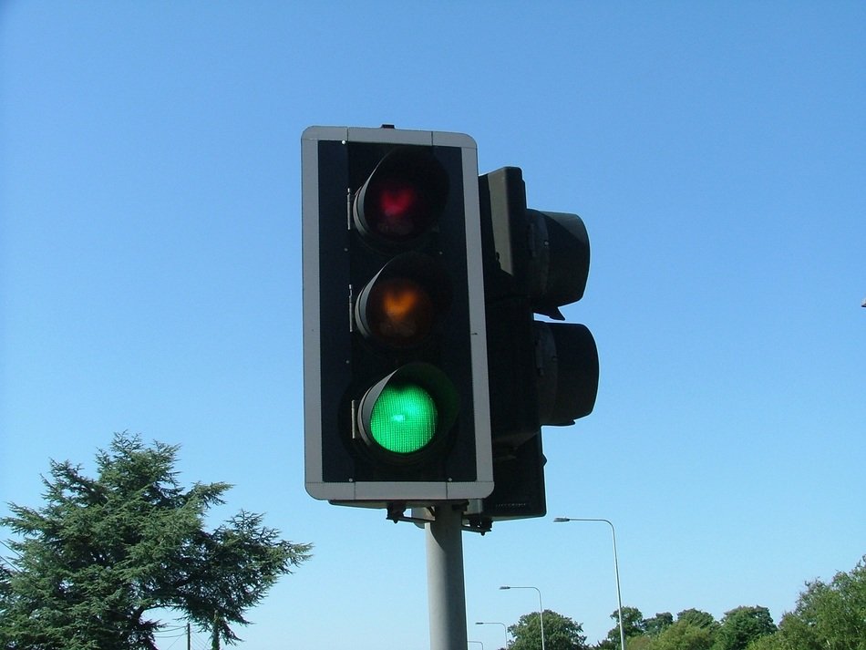 traffic lights at blue sky