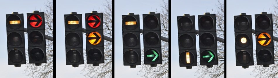 traffic lights with arrows on the road