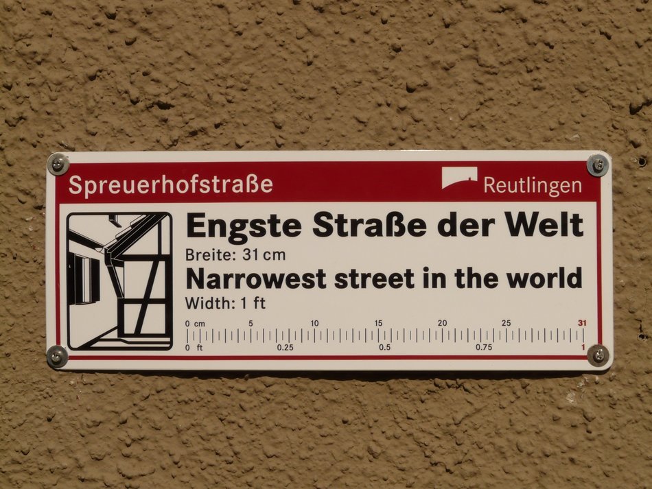 sign about spreuerhofstraße as the narrowest street in the world, Germany, Reutlingen