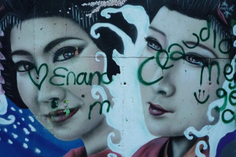 graffiti of geisha on the wall
