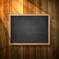 Blank chalkboard on Wooden Wall
