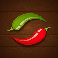 chili peppers on wooden background