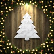 Paper Christmas Tree on Wooden background with bright wreath