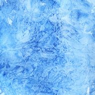 Watercolor blue paint spotted background