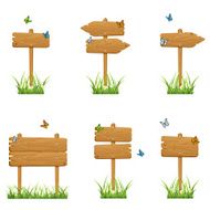 Set of wooden signs in grass
