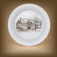 Decorative plate with drawing of old cottage