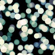 blurred dots on dark background N3