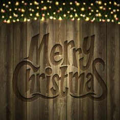 Merry Christmas lettering on Wooden background with bright garland