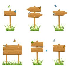 Set of wooden signs in grass