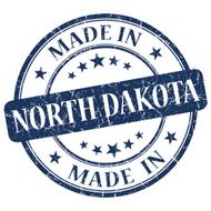 made in North Dakota blue round grunge isolated stamp
