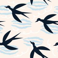 Swallows in the sky