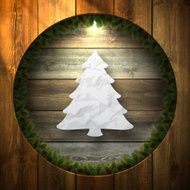 Paper Christmas Tree on Wooden background with wreath