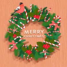 Festive christmas wreath with candy bullfinch and wooden letter