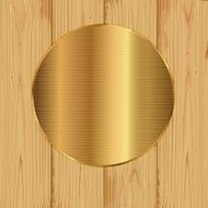 Gold round on a planks