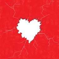 Hole in heart shape on the wall