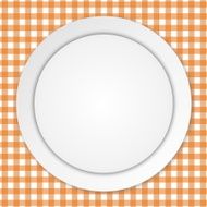 White plate on orange tablecloth