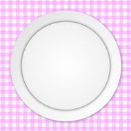 White plate on pink tablecloth