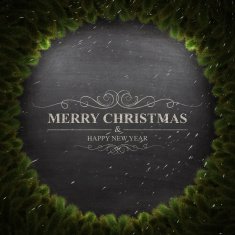 Merry Christmas lettering on Chalkboard with wreath and snow