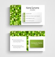 Modern business card with green a triangular pattern