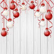 Red Christmas balls on wooden background