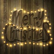 Merry Christmas Background with lights on wooden Wall