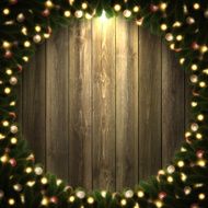 Blank Wooden background with bright Christmas wreath