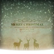 Merry Christmas lettering with snow and reindeers on vintage background
