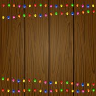 Christmas garland on wooden background