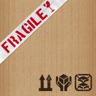 fragile adhesive tape on cardboard with rubber stamps