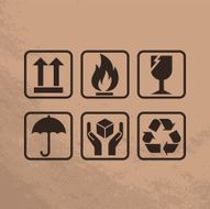 Fragile Symbols On Brown Paper