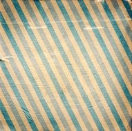 Vintage blue diagonal striped paper background