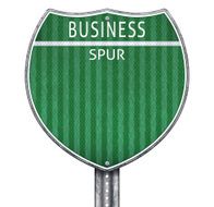 Business spur road sign