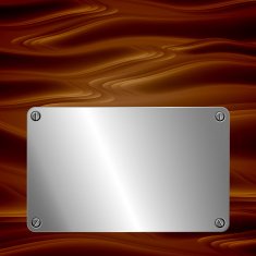 Metal plate on wooden surface