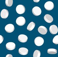Background with three dimensional white pills