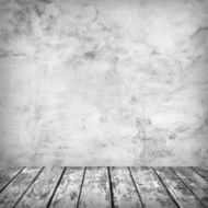 Empty room with concrete wall and old wooden floor