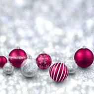 Silver background with magenta christmas balls
