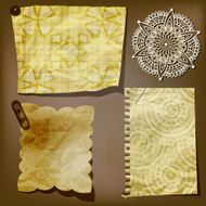 Scrap template of vintage paper pieces and lacy flower