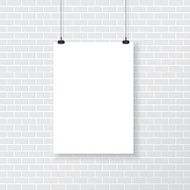 White poster on brick wall N2