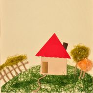 Village house with garden fence and road