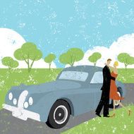 couple embracing beside car N2