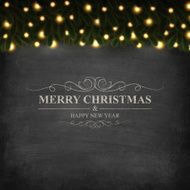 Merry Christmas lettering on Chalkboard with bright garland