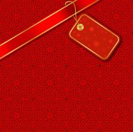Silky Red Ribbon &amp; Tag on Decorative Background