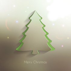 Paper Christmas Tree on blurred and bright Background