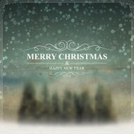 Blurred winter Landscape with Snow and Christmas Trees Vintage background
