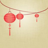 String of red lanterns are hanging on linen texture background