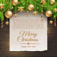 Christmas tree branches with golden decoration &amp; greeting paper banner