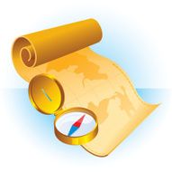 Gold compass and vintage map