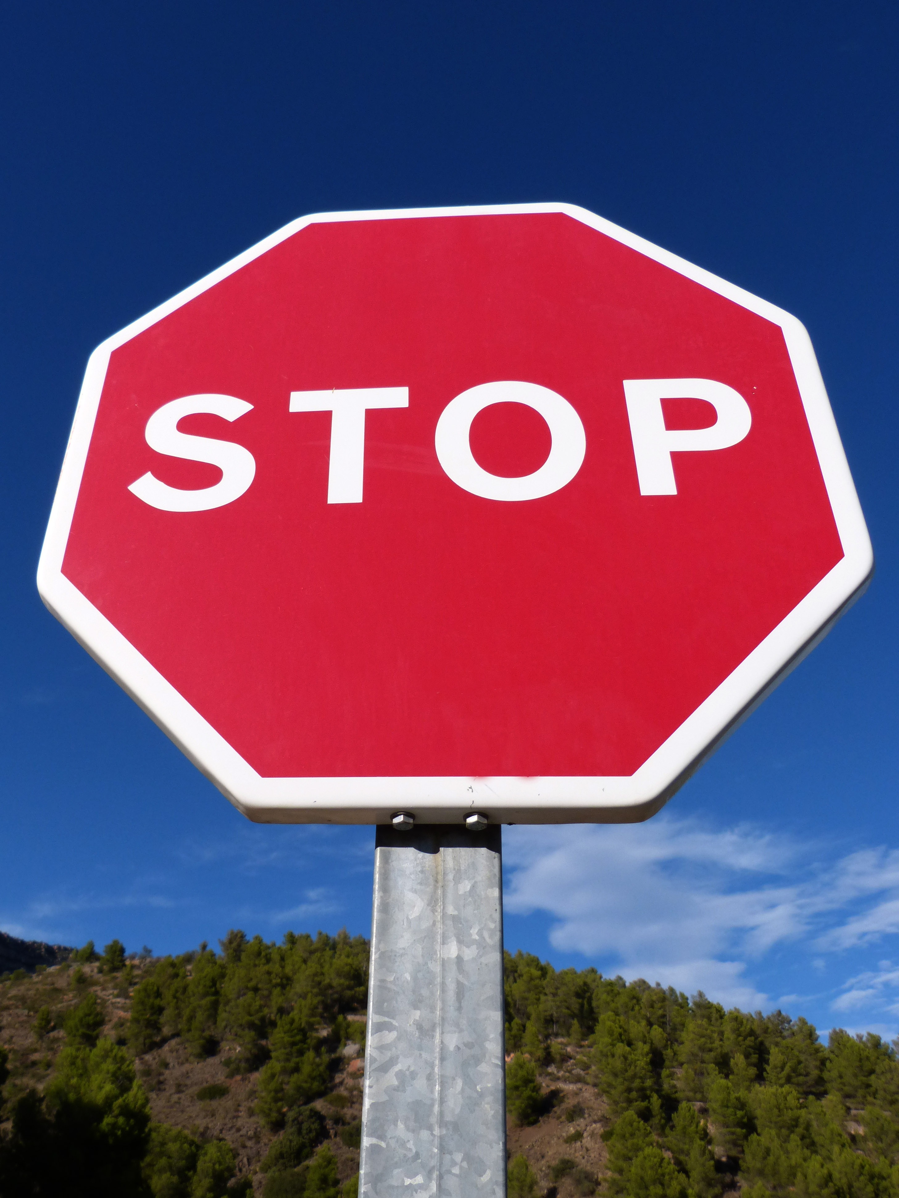 Stop Sign On The Road Free Image Download