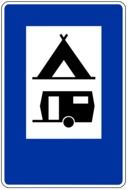 road sign tent camp